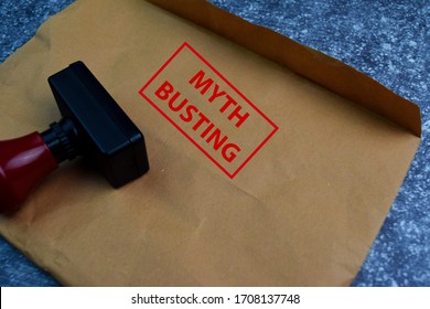 Myth Busting Text On Document Above Brown Isolated On Office Desk