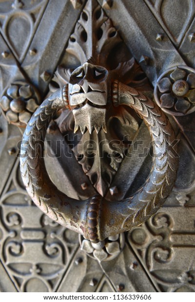 Mythical Door Knocker On Castle Door Stock Photo Edit Now