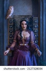 Mythical fantasy woman queen vamp sits on medieval ancient throne. Golden gothic crown on head. Elf girl princess evil face black long hair. Purple vintage art dress. Barn Owl bird symbol wisdom.
