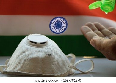 N95 mask , sanitizer with Indian flag in the background - Powered by Shutterstock