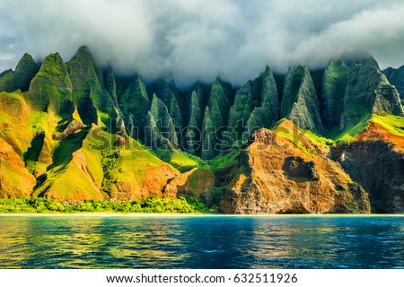 Na Pali coast, Kauai, Hawaii view from sea sunset cruise tour. Nature coastline landscape in Kauai island, Hawaii, USA. Hawaii travel.