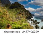 The Na Pali headlands dive into the pacific ocean along the north coast of the island of Kauai, Hawaii.