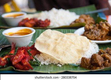 Naan Ot Chapati - The Major Food Of Indian Tradition Eating  - Naan Is Flat Bread Over Steamed Rice On Banana Leaf Plate Eat With Several Type Of Curry