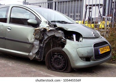 Naarden, Gooise Meren, The Netherlands - March 25, 2018: Citroën C1 With Accident Damage Parked By The Side Of The Road. Nobody In The Vehicle.