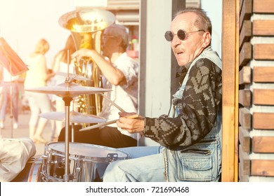 NABEREZHNYE CHELNY - 20 August 2017: Old Man Playing Drums On Street