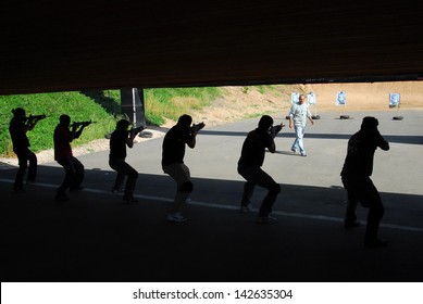 NACHAL OZ, ISR - MAR 26 2008:Security personal  practice in shooting Range.It's forbidden in Israel to own any kind of firearm, including air pistols and rifles, without a firearms license