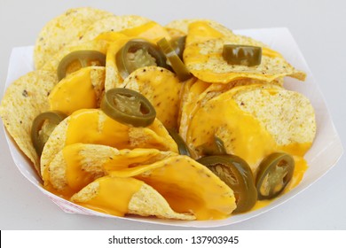 Nacho chips, cheese and peppers