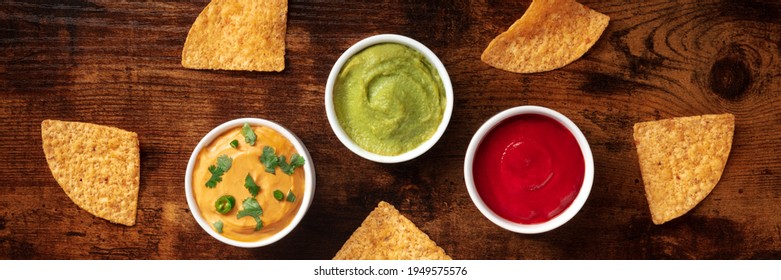 Nacho chips and dips panorama, top shot - Powered by Shutterstock