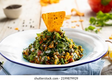 Nacho Salad Served In A Dish Isolated On Napkin Side View Of Arab Food