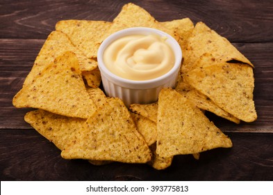 Nachos And Cheese Dip On Table