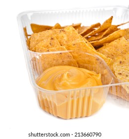 Nachos Chips With Cheese Sauce In Plastic Container Close Up  Isolated On White Background