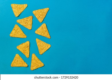 Nachos Chips On A Blue Background Close Up