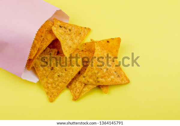 Download Nachos Chips On Yellow Paper Background Stock Photo Edit Now 1364145791 Yellowimages Mockups
