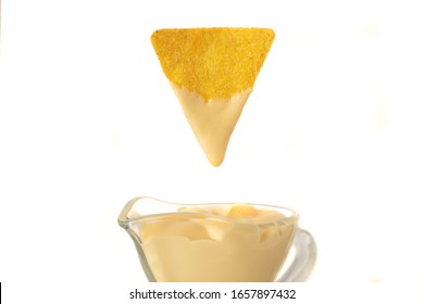 Nachos dip in cheese sauce