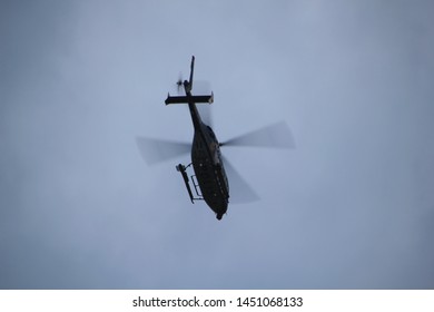 Nacka/stockholm, Sweden; July 11, 2019; Police helicopter hovering over nacka county outside stockholm