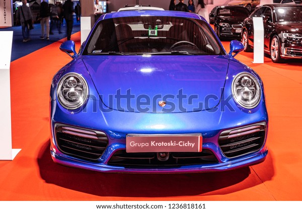 Nadarzyn, Poland, November 16, 2018: metallic\
blue Porsche 911 Turbo S at Warsaw Motor Show, supercar\
manufactured by\
Porsche