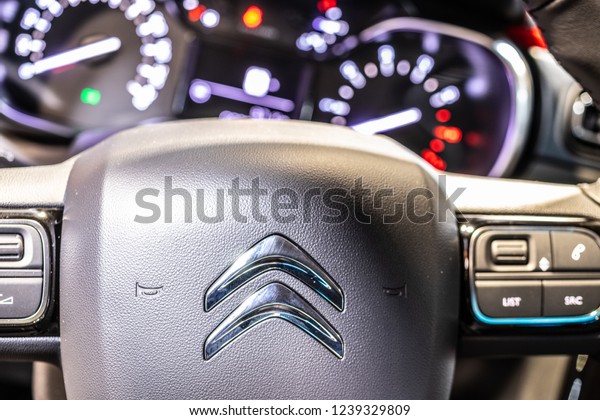 Nadarzyn, Poland,\
November 16, 2018: control board, logo, steering wheel, upholstery\
of Citroen C3 at Warsaw Motor Show, car produced by French car\
manufacturer Citroen