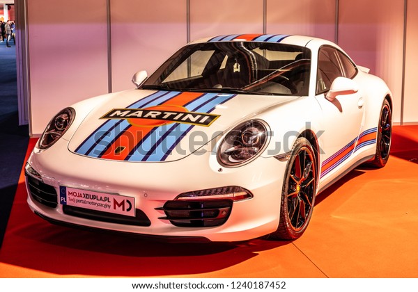 Nadarzyn, Poland, November 16, 2018: white Porsche\
911 Turbo with MARTINI logo, emblem, brand of Italian vermouth at\
Warsaw Motor Show