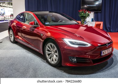 Nadarzyn, Poland, October 27, 2017: metallic red Tesla Model S 60D at Warsaw Moto Show, produced by American automaker Tesla, owned by Elon Musk - main shareholder