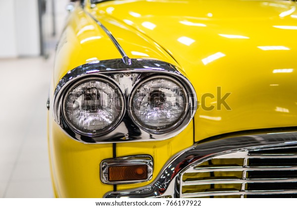Nadarzyn, Poland, October 27, 2017 Warsaw Moto Show:\
Iconic vintage metallic yellow Checker Marathon Taxi Cab 1965, from\
movie \