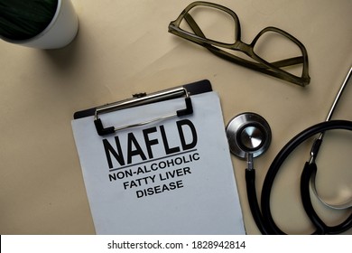 NAFLD - Non-Alcoholic Fatty Liver Disease write on a paperwork isolated on office desk. - Shutterstock ID 1828942814