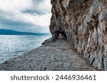 Nafplio, Greece. Walking path by the sea. The promenade of Arvanitia as Nafplio inhabitants call it is one of the most beautiful walks that Nafplion has for everyone.