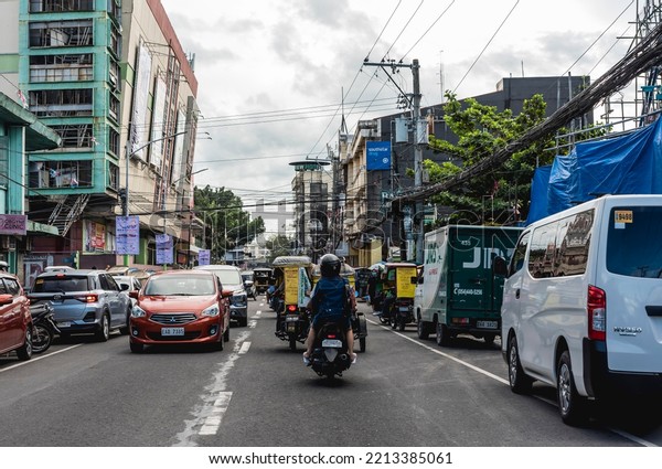 Naga City, Camarines Sur, Philippines - Oct\
2022: A busy scene along Gen Luna\
Avenue.