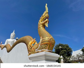 Naga Statue,Serpent Statue And Blue Sky,Sculpture Of Naga In The Park.