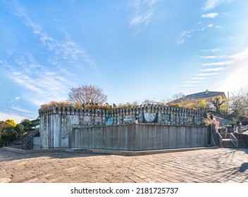 Nagasaki, Kyushu - December 13 2021: Walls Of The Historical Fountain Called Rekishi-no-izumi Below The Garden Of The British Residence Of Thomas Blake Glover In The Glover Garden.