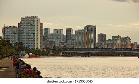 Nagatino District Modern Buildings On Nagatinsky Metro Bridge, Moscow River And Embankment Alley Way Background At Summer Evening, Capital Cityscape, Russia