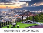 Nago, Okinawa, Japan downtown cityscape at twilight from the park.