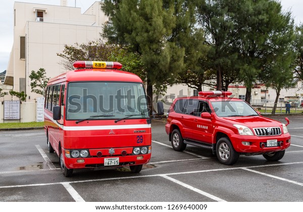 Nago, Okinawa, Japan - January 6 2016: Fire\
ambulances of the Nago Fire Department on occasion of a help and\
rescue training