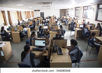 NAGPUR, MAHARASHTRA, INDIA, 11 APRIL 2016 : Unidentified Young Students Of Information Technology Using Computers For Taking Information  For Their Study.