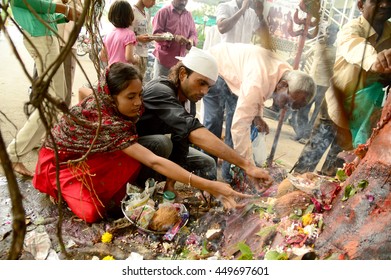 NAGPUR, MAHARASHTRA, INDIA - AUGUST 01 : People worship of Snake God in "Nag Panchami" festival. It is traditional worship of snakes or serpents observed by Hindus in Nagpur, India on 01 August 2014