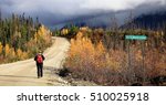 Nahanny Range Road, Yukon - walking along the road near North Moose Creek in contrasty light