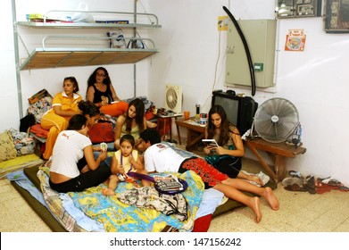 NAHARIA, ISR - JULY 21 2006:Israeli People Living In Bomb Shelter During 2006 Lebanon War.The State Of Israel Requires All Buildings To Have Access To Air Raid Shelters From 1951.