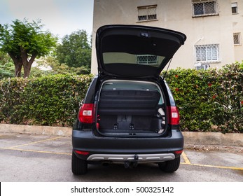 NAHARIYA,ISRAEL,SEPTEMBER 23 2016 PARKING AT HOME WITH OPEN TRUNK.