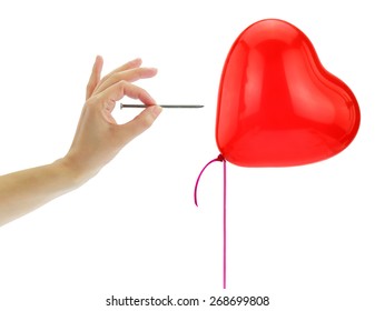 Nail About To Pop A Heart Balloon Isolated On White