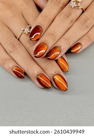 nail art cateyes basic black color and orange cateye nail art viral, nail extension gel polish