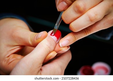 Nail Art, Close-up Of Hands Trimming Nails