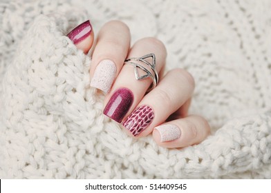 nail art and knitted sweater