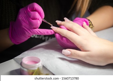 Nail Artist Applying Gel On The Nails