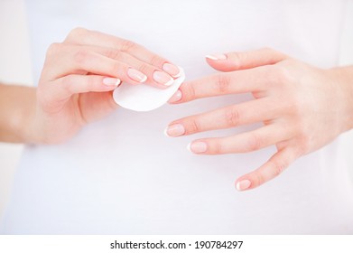 Nail Care. Close-up Of Woman Cleaning Nails With Cotton Pad