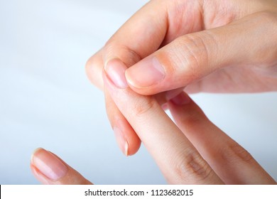 Nail Care, Woman's Hands, White Background