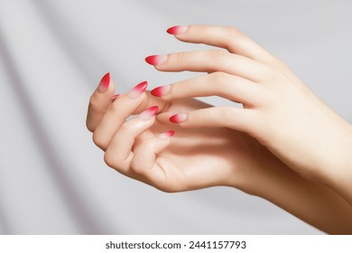 hands pedicure red gel