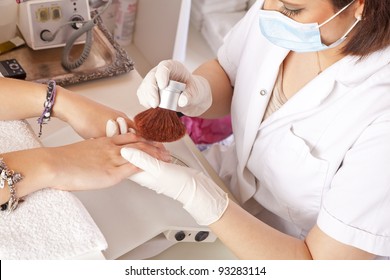 Nail Designer Working On Acrylic Toenails