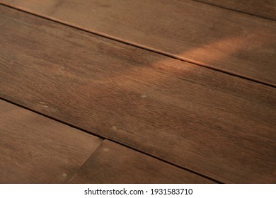 Nail Holes On Hardwood Floor Have Been Filled By Wood Filler In Wood Floor Refinishing Method.