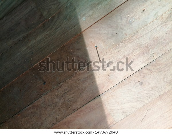 Nail On Wood Parquet Floor During Stock Photo Edit Now 1493692040