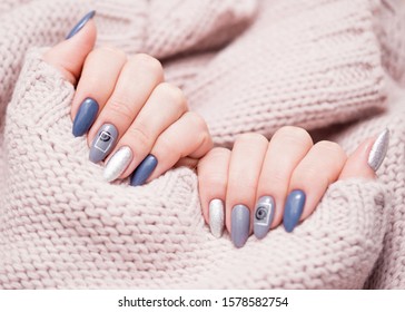 Nail Polish  Art Manicure  Modern style Nail Polish Stylish pastel Color pink Nails holding wool material sleeve blouse  