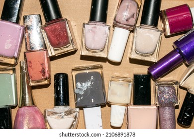 Nail Polish For Painting Nails.A Variety Of Varnishes Background.Different Types Of Paint And Varnish Materials.